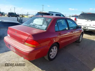 2002 Mitsubishi Lancer LS with VIN JA3AJ36E82U063279, listed as a IAAI auction lot 41711543 with 39,127 mi miles. Bid and sale history available at carsss.com. Image 4.