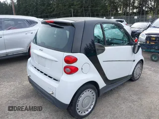2014 Smart fortwo Pure with VIN WMEEJ3BA8EK747384, listed as a IAAI auction lot 41979651 with 29,586 mi miles and . Bid and sale history available at DreamBid. Image 4.