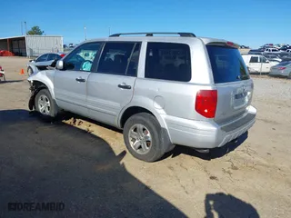 2003 Honda Pilot EX with VIN 2HKYF18683H579746, listed as a IAAI auction lot 41206240 with 196,467 mi miles. Bid and sale history available at carsss.com. Image 3.