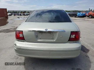 2003 Mercury Sable LS Premium с VIN 1MEFM55S23A617225, выставлен на аукционе Copart как лот 52021765 с пробегом 131 291 миль миль и Списание • Salvage title. История ставок и продаж доступна на DreamBid. Изображение 6.