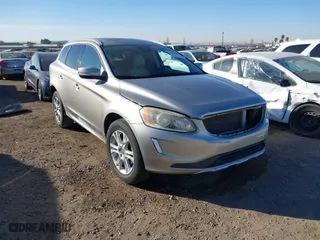 2014 Volvo XC60 3.2L with VIN YV4940DL7E2502500, listed as a IAAI auction lot 41410044 with 54,784 mi miles. Bid and sale history available at carsss.com. Image 1.