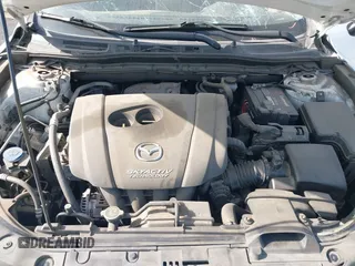 2014 Mazda 3 i Grand Touring with VIN JM1BM1W7XE1151579, listed as a IAAI auction lot 41984987 with 144,589 mi miles and . Bid and sale history available at DreamBid. Image 10.