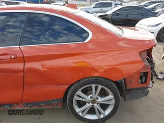 2015 BMW 2 Series 228i with VIN WBA1F9C56FVW98461, listed as a IAAI auction lot 41663193 with 94,584 mi miles. Bid and sale history available at carsss.com. Image 18.