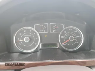 2009 Ford Taurus SE with VIN 1FAHP23W89G125025, listed as a Copart auction lot 80710004 with 114,176 mi miles and Salvage Title. Bid and sale history available at carsss.com. Image 9.