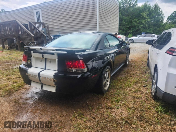 2002 Ford Mustang Standard with VIN 1FAFP40412F170034, listed as a Copart auction lot 61275825 with 174,868 mi miles and Salvage title. Bid and sale history available at DreamBid. Image 4.