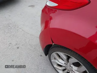 2012 Hyundai Veloster w/Black Int with VIN KMHTC6AD7CU072850, listed as a IAAI auction lot 41868715 with 141,792 mi miles and . Bid and sale history available at DreamBid. Image 6.