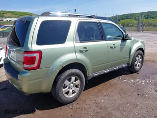 2009 Ford Escape Hybrid with VIN 1FMCU493X9KA56174, listed as a IAAI auction lot 39435925 with 158,171 mi miles. Bid and sale history available at carsss.com. Image 4.