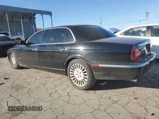 2005 Jaguar XJ VDP with VIN SAJWA82C75SG45094, listed as a Copart auction lot 83891564 with 57,467 mi miles and Salvage Title. Bid and sale history available at carsss.com. Image 2.