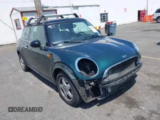 2010 MINI Hardtop with VIN WMWMF3C58ATZ67297, listed as a IAAI auction lot 42497090 with 68,541 mi miles and . Bid and sale history available at DreamBid. Image 1.
