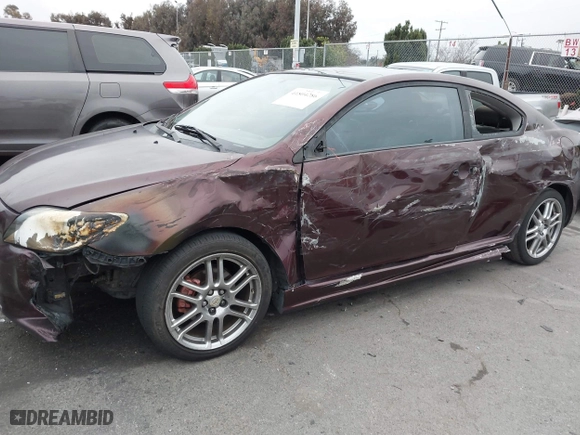 2006 Scion tC with VIN JTKDE177560086287, listed as a IAAI auction lot 41804286 with 276,772 mi miles. Bid and sale history available at carsss.com. Image 6.