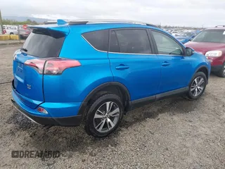 2018 Toyota RAV4 XLE with VIN 2T3RFREV0JW722354, listed as a IAAI auction lot 41974466 with 65,013 mi miles. Bid and sale history available at carsss.com. Image 4.
