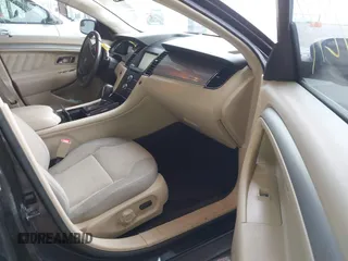 2015 Ford Taurus SEL z VIN 1FAHP2E86FG165100, wystawiony jako IAAI lot #42157272 z przebiegiem 141 846 mil mil oraz . Historia ofert i sprzedaży dostępna na DreamBid. Obrazek 5.
