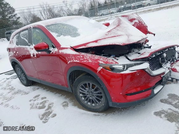 2019 Mazda CX-5 Touring with VIN JM3KFBCM7K0617066, listed as a IAAI auction lot 41617694 with NaN miles. Bid and sale history available at carsss.com. Image 1.