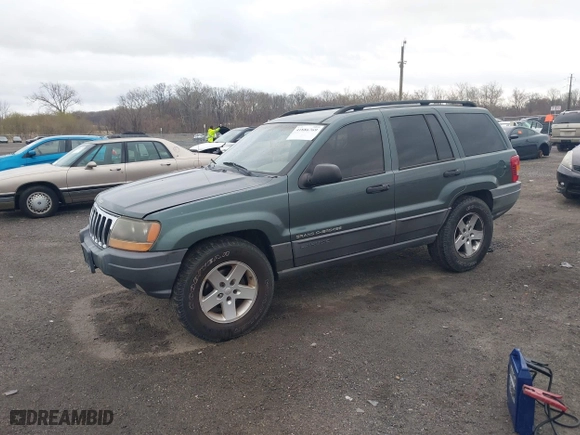 2002 Jeep Grand Cherokee Laredo with VIN 1J4GW48NX2C151430, listed as a IAAI auction lot 41886769 with 222,795 mi miles. Bid and sale history available at carsss.com. Image 2.
