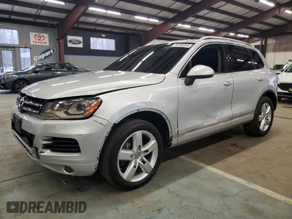 2012 Volkswagen Touareg Exec with VIN WVGEF9BP9CD009937, listed as a Copart auction lot 84596364 with 97,431 mi miles and Clean Title. Bid and sale history available at DreamBid. Image 1.