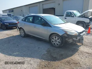 2012 Ford Focus SE with VIN 1FAHP3F21CL377518, listed as a IAAI auction lot 42400967 with 206,706 mi miles and . Bid and sale history available at DreamBid. Image 1.