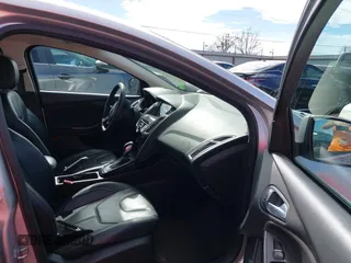 2017 Ford Focus Titanium with VIN 1FADP3N26HL309903, listed as a IAAI auction lot 41642306 with 107,762 mi miles and . Bid and sale history available at carsss.com. Image 5.