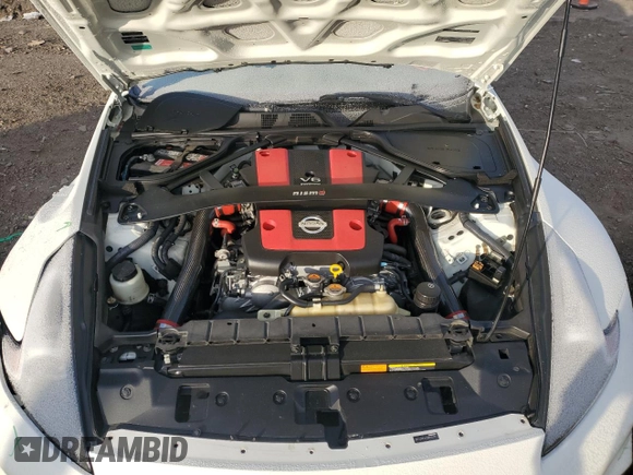 2016 Nissan 370Z z VIN JN1AZ4EH2GM935381, wystawiony jako Copart lot #83220624 z przebiegiem 56 907 mil mil oraz Szkoda całkowita • Salvage title. Historia ofert i sprzedaży dostępna na DreamBid. Obrazek 11.