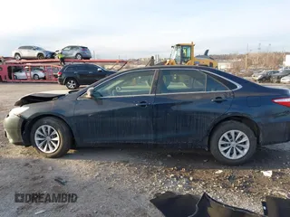 2016 Toyota Camry XLE with VIN 4T1BF1FK1GU509261, listed as a IAAI auction lot 41296127 with 159,300 mi miles and . Bid and sale history available at DreamBid. Image 13.