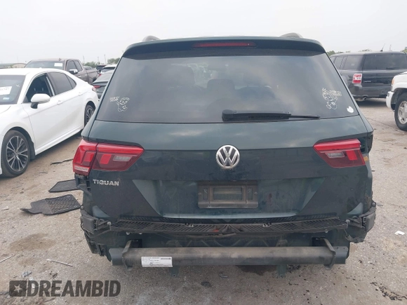 2019 Volkswagen Tiguan S with VIN 3VV1B7AXXKM002312, listed as a IAAI auction lot 42282809 with 80,781 mi miles and . Bid and sale history available at DreamBid. Image 16.
