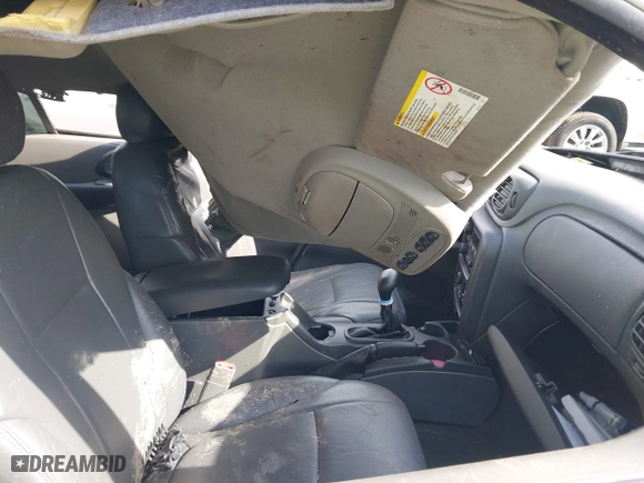 2004 Chevrolet TrailBlazer LT with VIN 1GNDS13S442417203, listed as a IAAI auction lot 41858690 with 98,983 mi miles. Bid and sale history available at carsss.com. Image 5.
