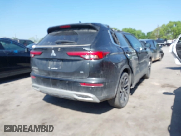 2022 Mitsubishi Outlander SE z VIN JA4J3UA8XNZ017053, wystawiony jako IAAI lot #41870657 z przebiegiem 70 102 mil mil oraz . Historia ofert i sprzedaży dostępna na DreamBid. Obrazek 4.