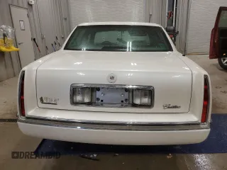 1994 Cadillac DeVille z VIN 1G6KD52B7RU290139, wystawiony jako Copart lot #46899465 z przebiegiem 133 110 mil mil oraz Czysty tytuł • Clean title. Historia ofert i sprzedaży dostępna na DreamBid. Obrazek 6.