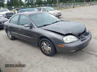 2002 Mercury Sable LS Premium z VIN 1MEHM55S22G612417, wystawiony jako IAAI lot #42765760 z przebiegiem 102 735 mil mil oraz . Historia ofert i sprzedaży dostępna na DreamBid. Obrazek 1.