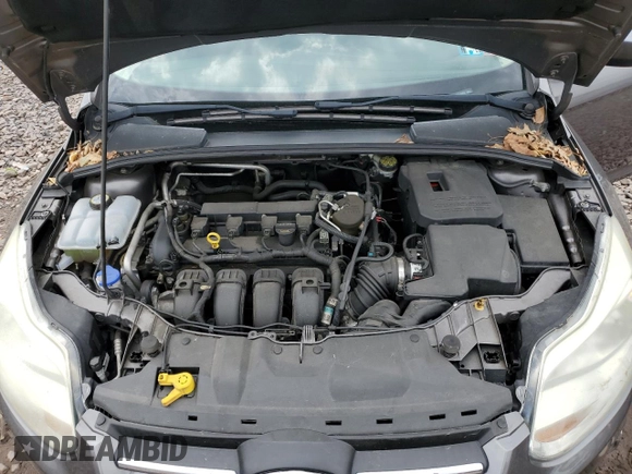 2012 Ford Focus SE with VIN 1FAHP3F25CL168038, listed as a Copart auction lot 51965405 with 80,843 mi miles and Salvage Title. Bid and sale history available at DreamBid. Image 11.