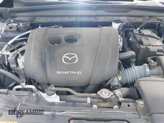 2024 Mazda CX-50 S Premium with VIN 7MMVABDM4RN157011, listed as a IAAI auction lot 42300111 with 39,863 mi miles and . Bid and sale history available at DreamBid. Image 10.