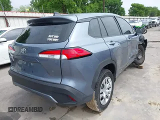 2023 Toyota Corolla Cross L with VIN 7MUAAAAG9PV047205, listed as a IAAI auction lot 41898077 with 29,184 mi miles and . Bid and sale history available at DreamBid. Image 4.