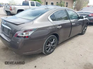 2014 Nissan Maxima S with VIN 1N4AA5AP0EC431251, listed as a IAAI auction lot 42120884 with 163,628 mi miles and . Bid and sale history available at DreamBid. Image 4.