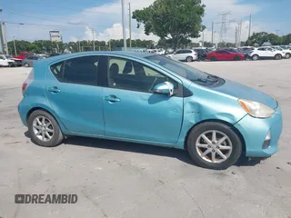 2013 Toyota Prius One z VIN JTDKDTB38D1039697, wystawiony jako IAAI lot #42378154 z przebiegiem 177 044 mil mil oraz . Historia ofert i sprzedaży dostępna na DreamBid. Obrazek 13.