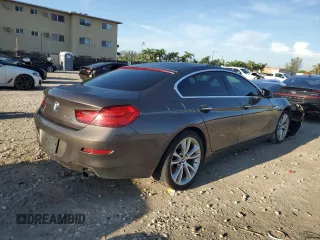 2014 BMW 6 Series 640i z VIN WBA6A0C58EDZ04545, wystawiony jako Copart lot #71086984 z przebiegiem 99 048 mil mil oraz Szkoda całkowita • Salvage title. Historia ofert i sprzedaży dostępna na DreamBid. Obrazek 3.