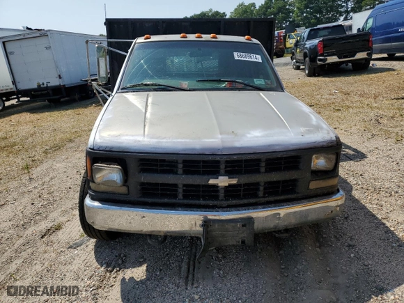 1997 Chevrolet C/K 3500 with VIN 1GBJK34R1VF054943, listed as a Copart auction lot 68689614 with NaN miles and Salvage Title. Bid and sale history available at carsss.com. Image 5.