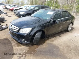 2009 Mercedes-Benz C-Class 3.0L Sport with VIN WDDGF81X99R070764, listed as a IAAI auction lot 41971687 with 142,718 mi miles. Bid and sale history available at carsss.com. Image 17.