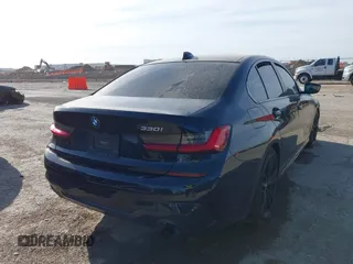 2021 BMW 3 Series 330i z VIN 3MW5R1J05M8B84800, wystawiony jako IAAI lot #41818906 z przebiegiem Nie podano mil oraz . Historia ofert i sprzedaży dostępna na DreamBid. Obrazek 4.