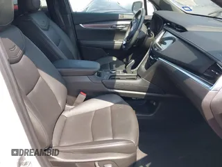 2023 Cadillac XT6 FWD Luxury z VIN 1GYKPAR4XPZ182533, wystawiony jako IAAI lot #42078937 z przebiegiem 31 248 mil mil oraz . Historia ofert i sprzedaży dostępna na DreamBid. Obrazek 5.