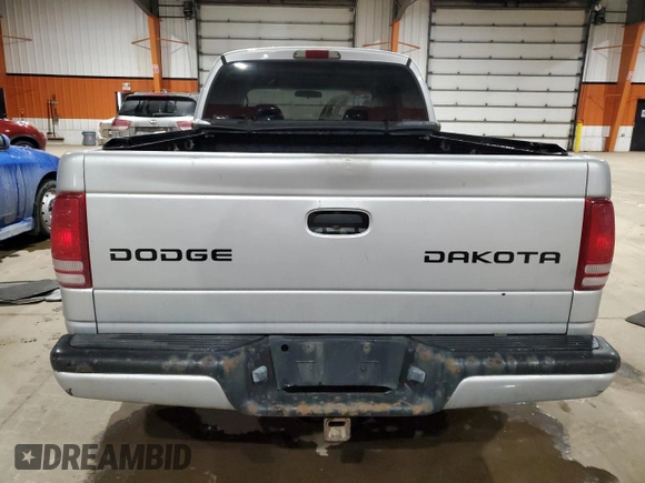 2003 Dodge Dakota Sport with VIN 1D7HL38N93S211272, listed as a Copart auction lot 86340074 with 356,331 mi miles and Salvage Title. Bid and sale history available at carsss.com. Image 6.