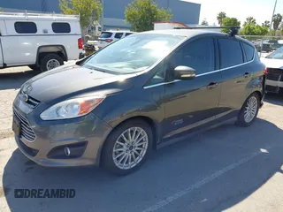 2016 Ford C-Max SEL z VIN 1FADP5CU1GL112085, wystawiony jako IAAI lot #42239257 z przebiegiem 88 149 mil mil oraz . Historia ofert i sprzedaży dostępna na DreamBid. Obrazek 2.