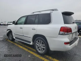 2015 Lexus LX 570 with VIN JTJHY7AXXF4185222, listed as a Copart auction lot 83833874 with 165,154 mi miles and Salvage Title. Bid and sale history available at DreamBid. Image 2.