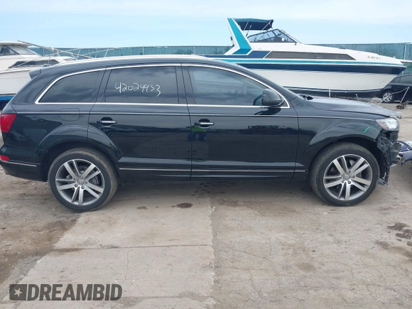 2015 Audi Q7 Premium Plus with VIN WA1LGAFE6FD013994, listed as a IAAI auction lot 42029953 with 124,148 mi miles and . Bid and sale history available at DreamBid. Image 14.