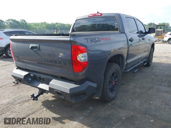 2021 Toyota Tundra SR5 with VIN 5TFDY5F19MX004939, listed as a IAAI auction lot 42197440 with 94,299 mi miles and . Bid and sale history available at DreamBid. Image 4.