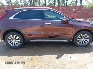 2023 Cadillac XT4 AWD Premium Luxury with VIN 1GYFZDR46PF125499, listed as a IAAI auction lot 41919403 with 44,647 mi miles and . Bid and sale history available at carsss.com. Image 13.