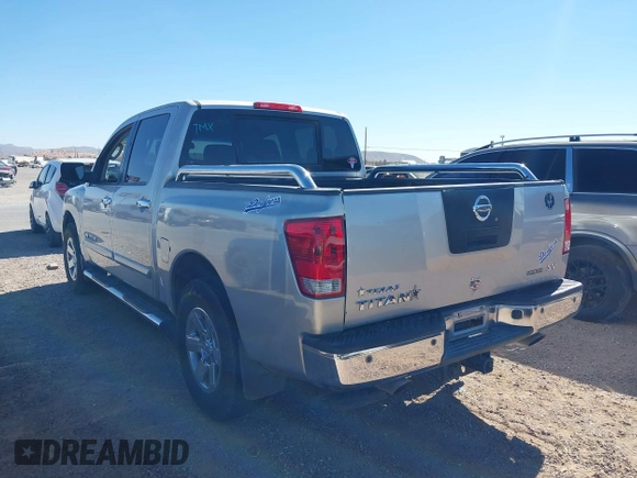 2011 Nissan Titan SV with VIN 1N6BA0ED7BN318878, listed as a IAAI auction lot 41518618 with 169,890 mi miles and . Bid and sale history available at DreamBid. Image 14.