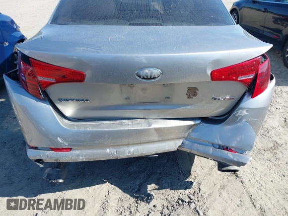 2013 Kia Optima EX with VIN 5XXGN4A75DG214845, listed as a IAAI auction lot 42026630 with 161,476 mi miles. Bid and sale history available at carsss.com. Image 6.