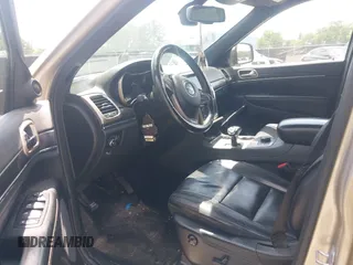 2014 Jeep Grand Cherokee Limited with VIN 1C4RJFBG1EC148701, listed as a IAAI auction lot 42552429 with 225,514 mi miles and . Bid and sale history available at DreamBid. Image 5.