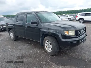 2007 Honda Ridgeline RTL with VIN 2HJYK16567H525426, listed as a IAAI auction lot 42667131 with 135,425 mi miles and . Bid and sale history available at DreamBid. Image 1.