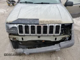 1996 Jeep Grand Cherokee Laredo with VIN 1J4GZ58Y5TC378100, listed as a Copart auction lot 85493724 with 0 mi miles and Salvage Title. Bid and sale history available at carsss.com. Image 13.