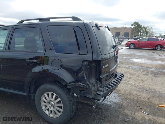 2009 Mercury Mariner Hybrid with VIN 4M2CU29319KJ18127, listed as a IAAI auction lot 41830660 with 273,438 mi miles. Bid and sale history available at carsss.com. Image 6.